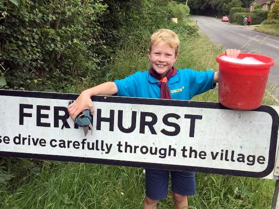 The Beavers helped clean up the village signs
