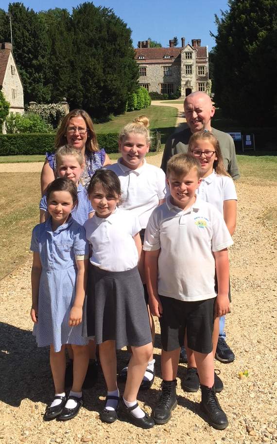 Parents Caroline Port and Donal O-Connell with Chawton Primary School pupils Ashling, Caitlin, Molly, Eva, Lily and Archie, who are set to benefit from money raised from the event.They are pictured in the driveway to Chawton House