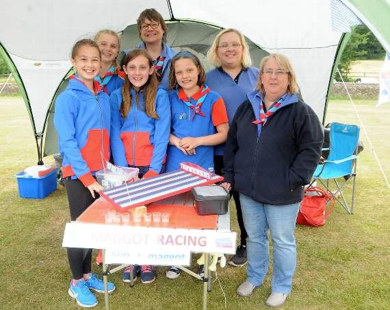 Members of the 1st Witley Guides on their stall (HD26-147-18)