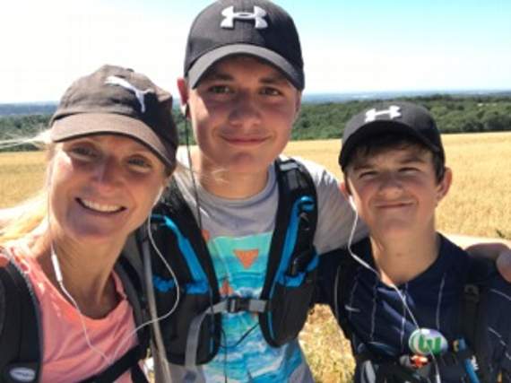 Emma Crabb with her son Tom and his fellow Bohunt School pupil Ben Mathieson, who completed the South Downs Way to raise funds for trips to the Himalayas and Greenland