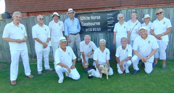 Rowledge Bowling Club, pictured with mascot, were convincing winners of the Midhurst Cup.