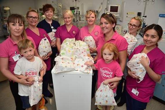 Riley and Emily with staff at the RSCH special baby care unit