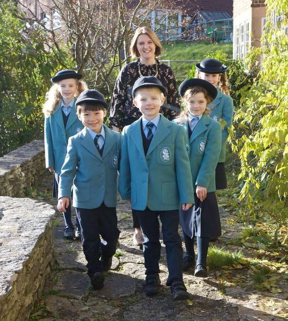 Headteacher Kay Goldsworthy and pupils are  celebrating an award-winning year and a bright new future for St Ives