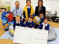 Pupils buoyant after RNLI cheque handover