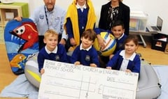 Pupils buoyant after RNLI cheque handover