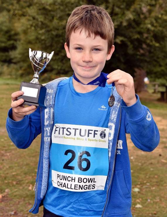 Eight year old Oliver Morley, winner of the 1K race (HD41-150-18)