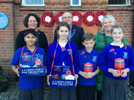 Camelsdale pupils with (left-right) town council clerk Lisa O’Sullivan, Jim Edwards and Sarah Palmer