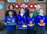 Camelsdale pupils with (left-right) town council clerk Lisa O’Sullivan, Jim Edwards and Sarah Palmer