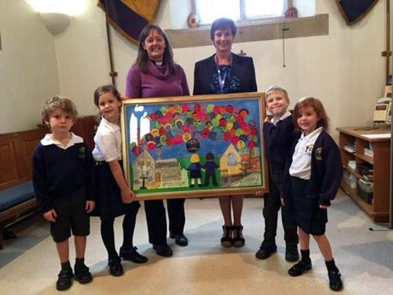 The framed collage was presented to Reverend Clare Challis at St John’s Church