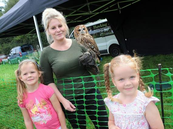 Evie and Penny with Emma Costick and tawny owl Fern – one of the birds from Hawking About (HD39-92-18)