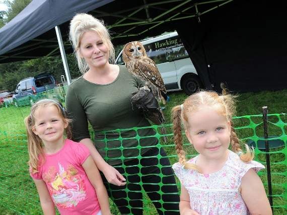 Evie and Penny with Emma Costick and tawny owl Fern – one of the birds from Hawking About (HD39-92-18)