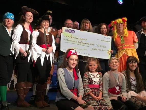 Theatre members accepting their bounty