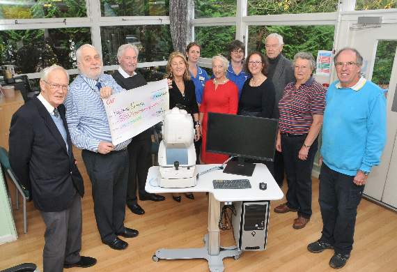 Rose Parry (wearing red) at the presentation at Haslemere Hospital