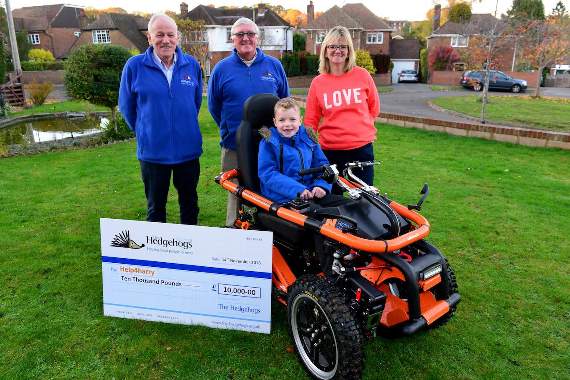 Left to right: The Hedgehogs’ Bob Hockey and Steve Tilburn with Harry and Sue Barnley with Harry’s new mobility hopper