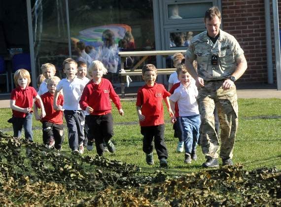 Pupils stand to attention for Army visit