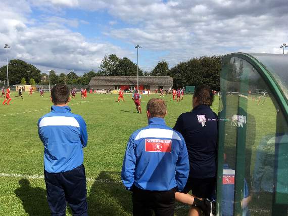 Badshot Lea bosses Gavin Smith and Dave Ford and coach Paul Harkness watch the drama unfold at Whitehall Lane in Reigate on Saturday