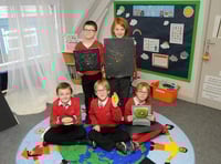 Art exhibition marks school den opening