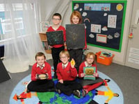 Art exhibition marks school den opening