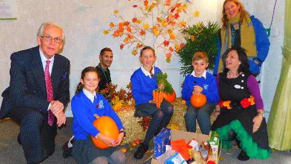 New manager Simon Lloyd with activity co-ordinator Zeita Morrison and Camelsdale Primary School pupils