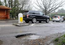 Councils face funding cuts over pothole repairs