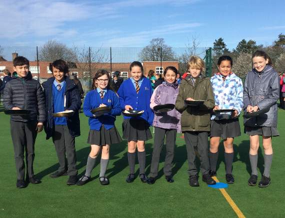 Pupils at South Farnham School having fun during one of their pancake races on Shrove Tuesday