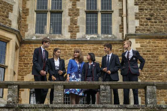 Principal Anne Lynch with students