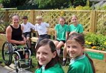 Golden Paralympian goes back to school