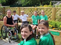 Golden Paralympian goes back to school