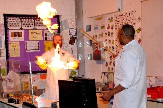 TV personality and scientist John Tickle playing with fire (LD40-84-19)