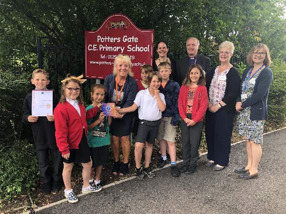 A group gathered for the presentation of Potters Gate Primary School’s first Angel Award
