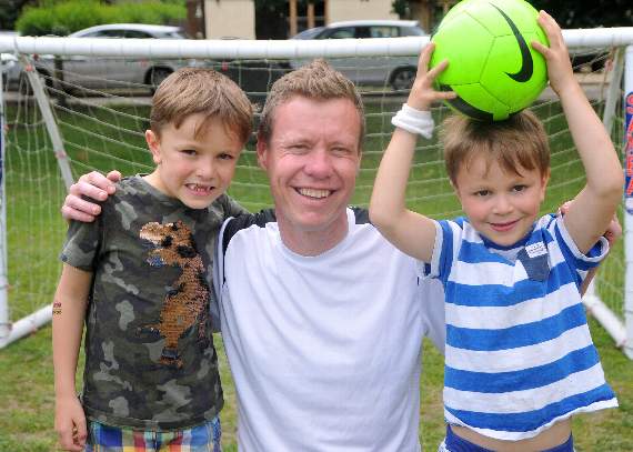 Henry and George Peters with Rob Bryson at Elstead. Picture order no: FD28-25-19