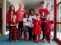 Children go red on catwalk for Comic Relief