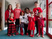 Children go red on catwalk for Comic Relief