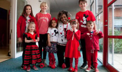 Children go red on catwalk for Comic Relief
