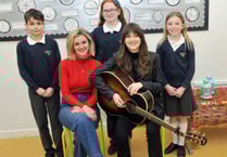 Ward Thomas twins are school's new heroes