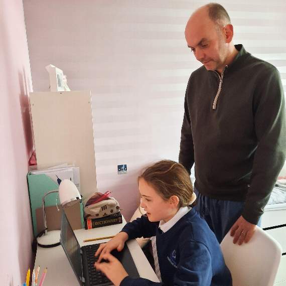 Darren Malone helping daughter Orla