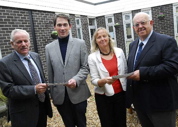 Cyril (pictured far right) was recognised with a Services to Farnham award in 2010/11