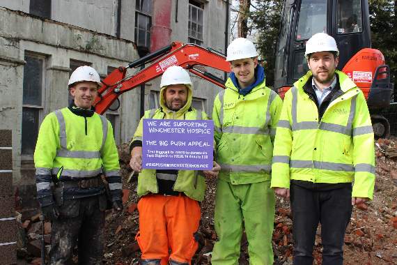 Builders outside Burrell House supporting The Big Push