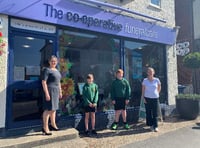Co-operative funeral arranger Ingrid Collins with Shottermill Junior School head girl Clorie Buckrell (left) and head boy Adam Wray (right), both aged 11 and school art teacher Olivia Harmer