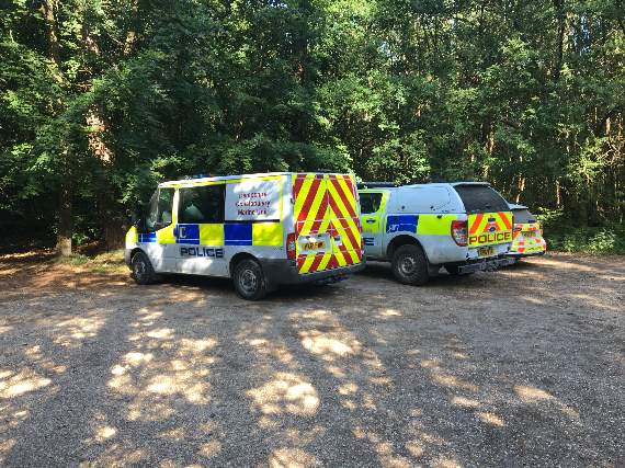 Police vans in Alice Holt Forest