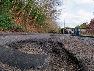 Don't just report potholes - protest