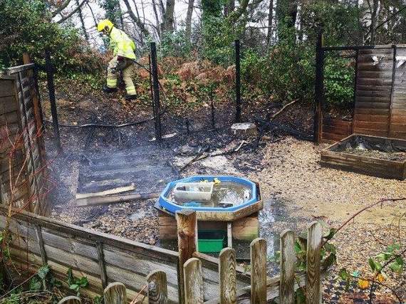 The damaged fencing and playhouse at Woodlea Primary School after the fire on January 11