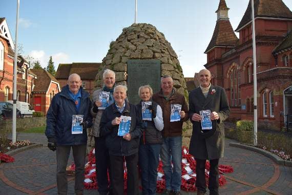 Allan Chick (front) with fellow Alton Town guides promoting their new leaflet – at the meeting point by The Cairn war memorial on Crown Hill