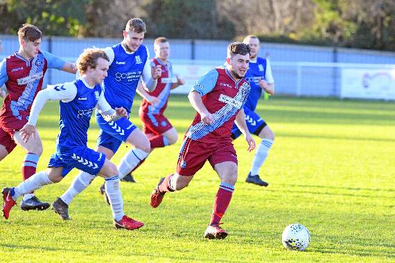 Badshot Lea midfielder Drew Matthews bombs forward. Picture order no: FD03-03-20