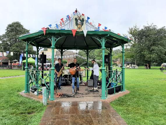Harry Baker and Band performing at Music in the Meadow in Gostrey Meadow
