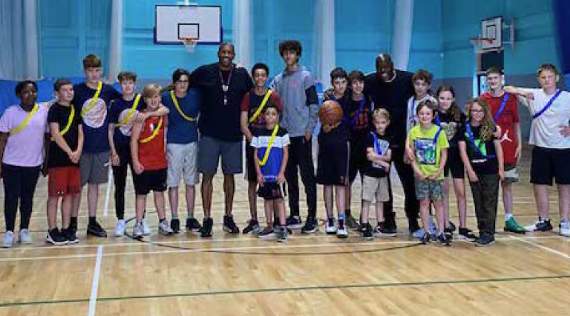 Former Harlem Globetrotter uses basketball to promote positivity