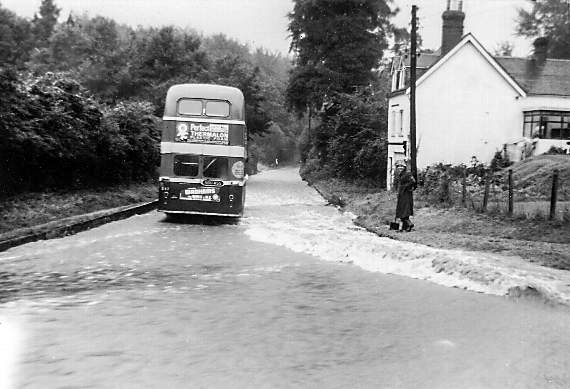 an Aldershot and District Traction Company number 18 bus travelling towards Headley