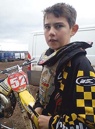 •Jack with his bike, a Suzuki RM85.