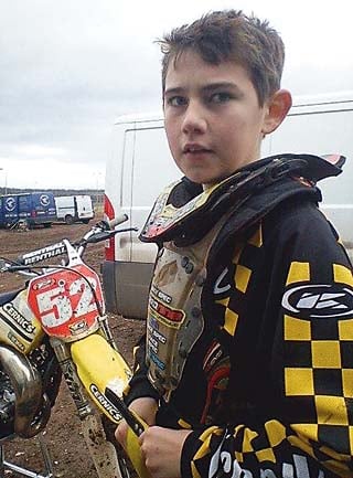 •Jack with his bike, a Suzuki RM85.