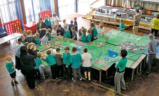 •The big picture. Pupils pore over the model they made of Lydney.